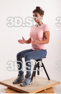 Sitting pose blue jeans pink t shirt of Oxana …